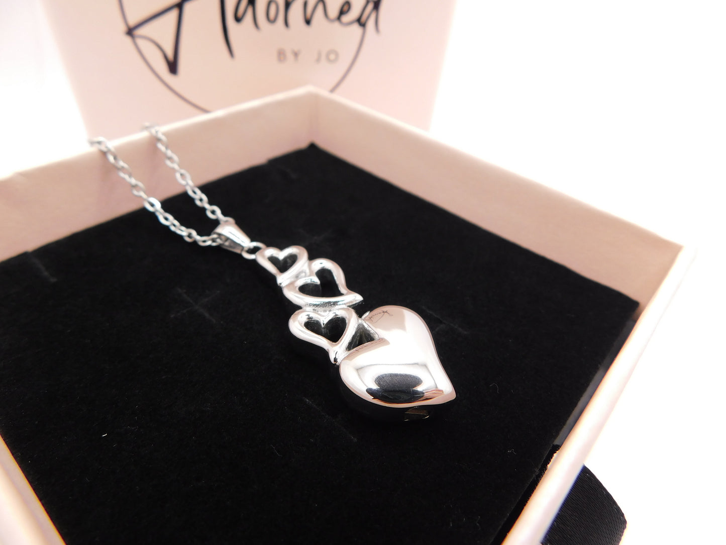 Tumbling hearts urn pendant