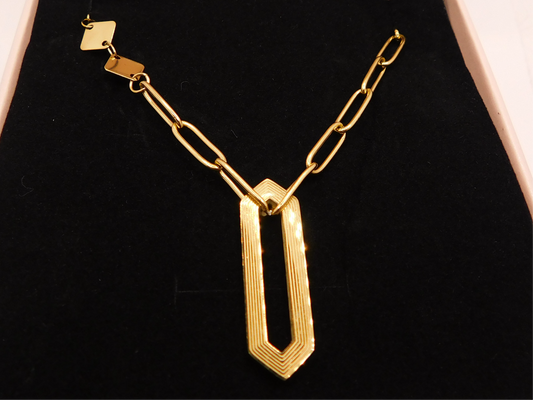 Asymmetrical paperclip chain with elongated hexagon pendant necklace