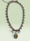 Unique Reworked Bow Brooch Necklace with Faceted Honey-Amber Glass Pendant